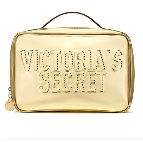 Victoria's Secret Handbags - VS travel case New in gold